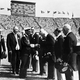 Britain's King George VI, in naval uniform, shakes hands with members of the International Olympic Committee during the opening ceremony of the XIV Summer Olympic Games, at Wembley Stadium, London, July 29, 1948. (AP Photo)